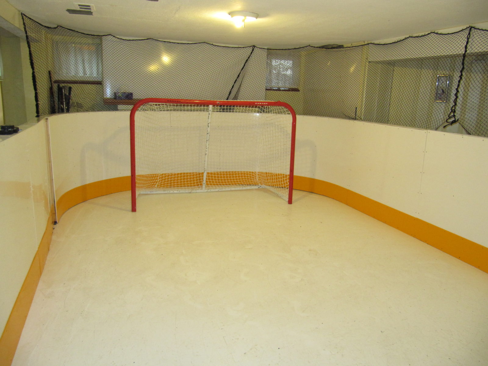 Basement synthetic ice rink