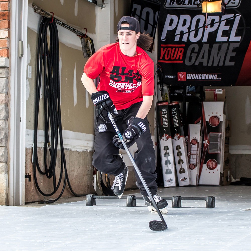 Hockey player training on Hockeyshot synthetic ice tiles